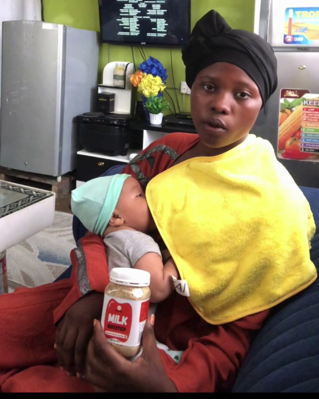 A mother with her baby holding Lishe360 Milk Booster